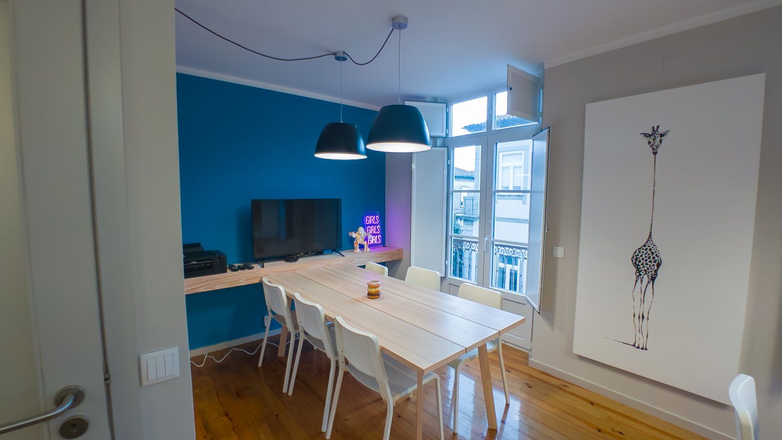 Coworking table with natural light at CasaGaea Stay